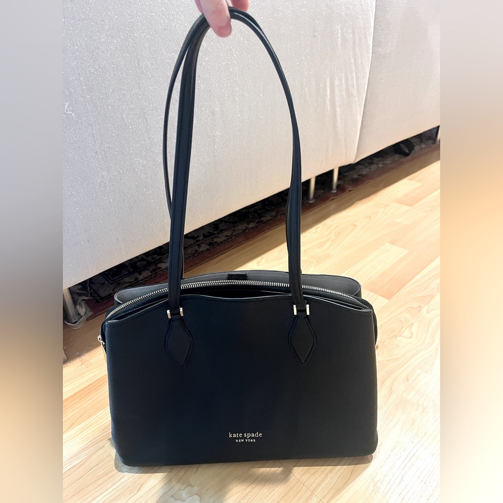 Black Kate Spade handbag. Bought in New York in 2022 and worn only once!